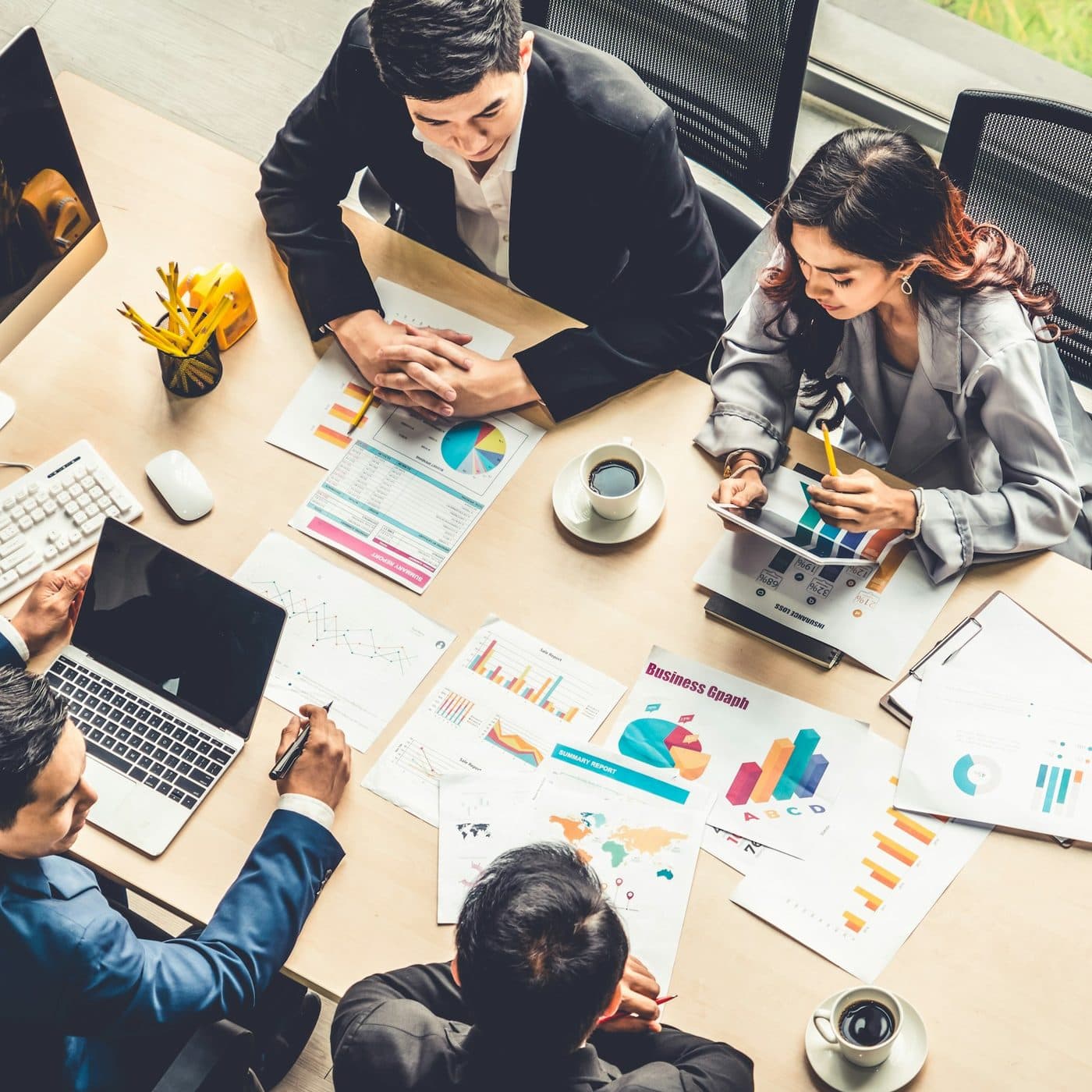 An innovation team working around a table