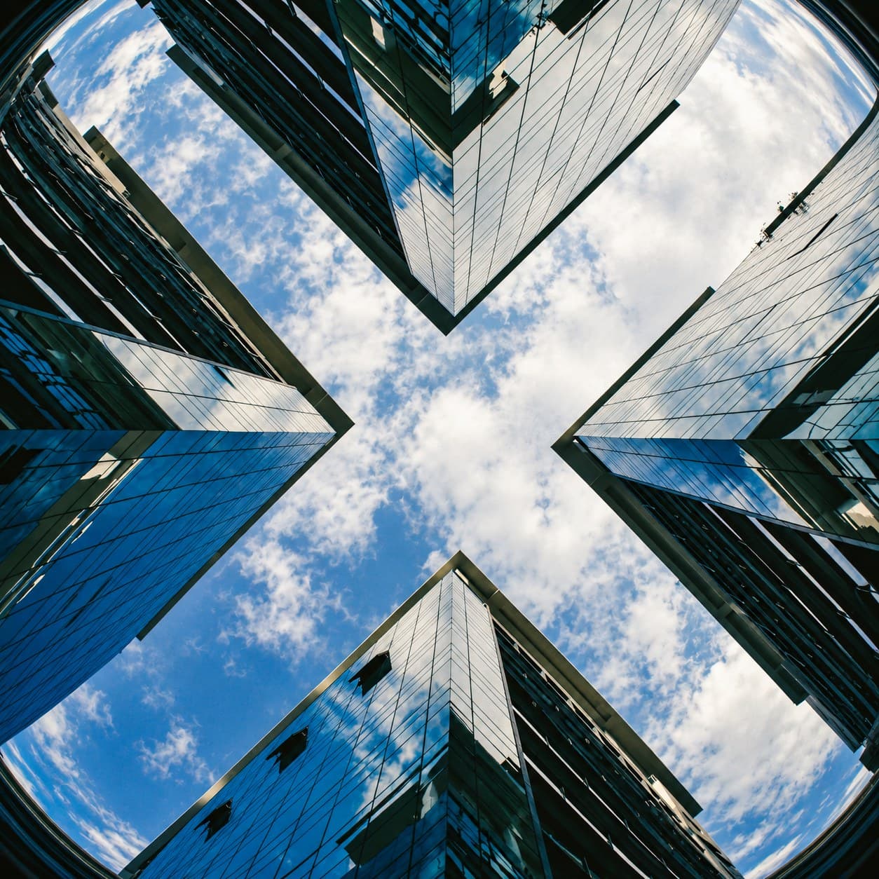 Towers forming an X, seen from below